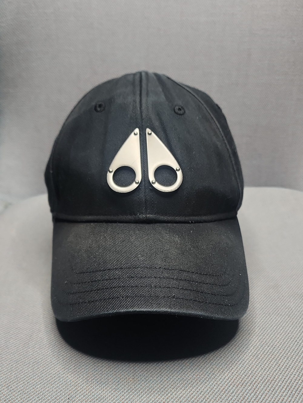 Moose Knuckles Black Cap with Silver Logo Accents